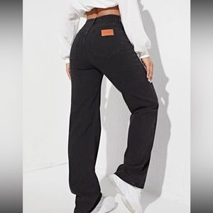 High wasted black straight leg patch detail